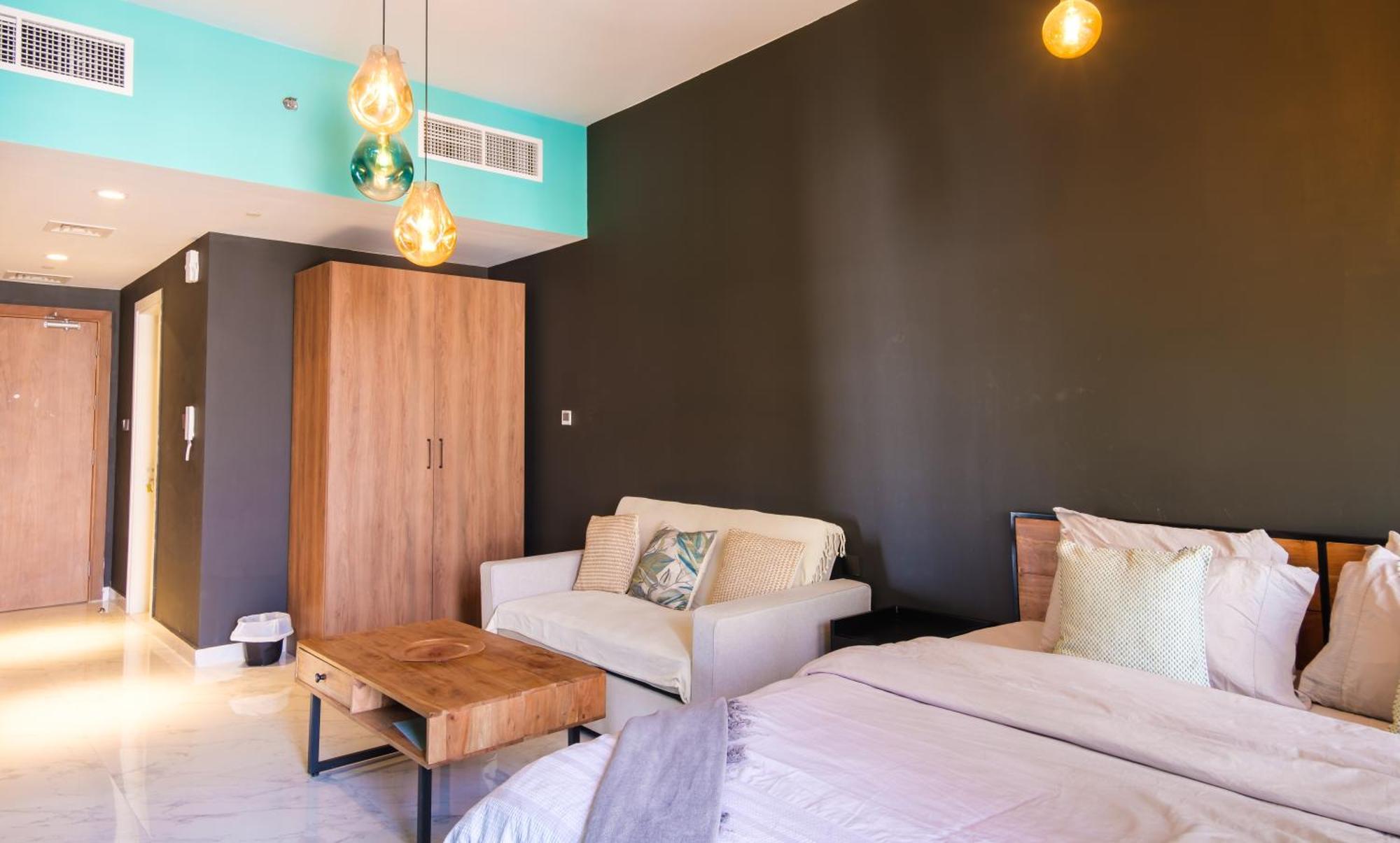 Appartement Industrial Chic Retreat à Al Qurayyah Extérieur photo