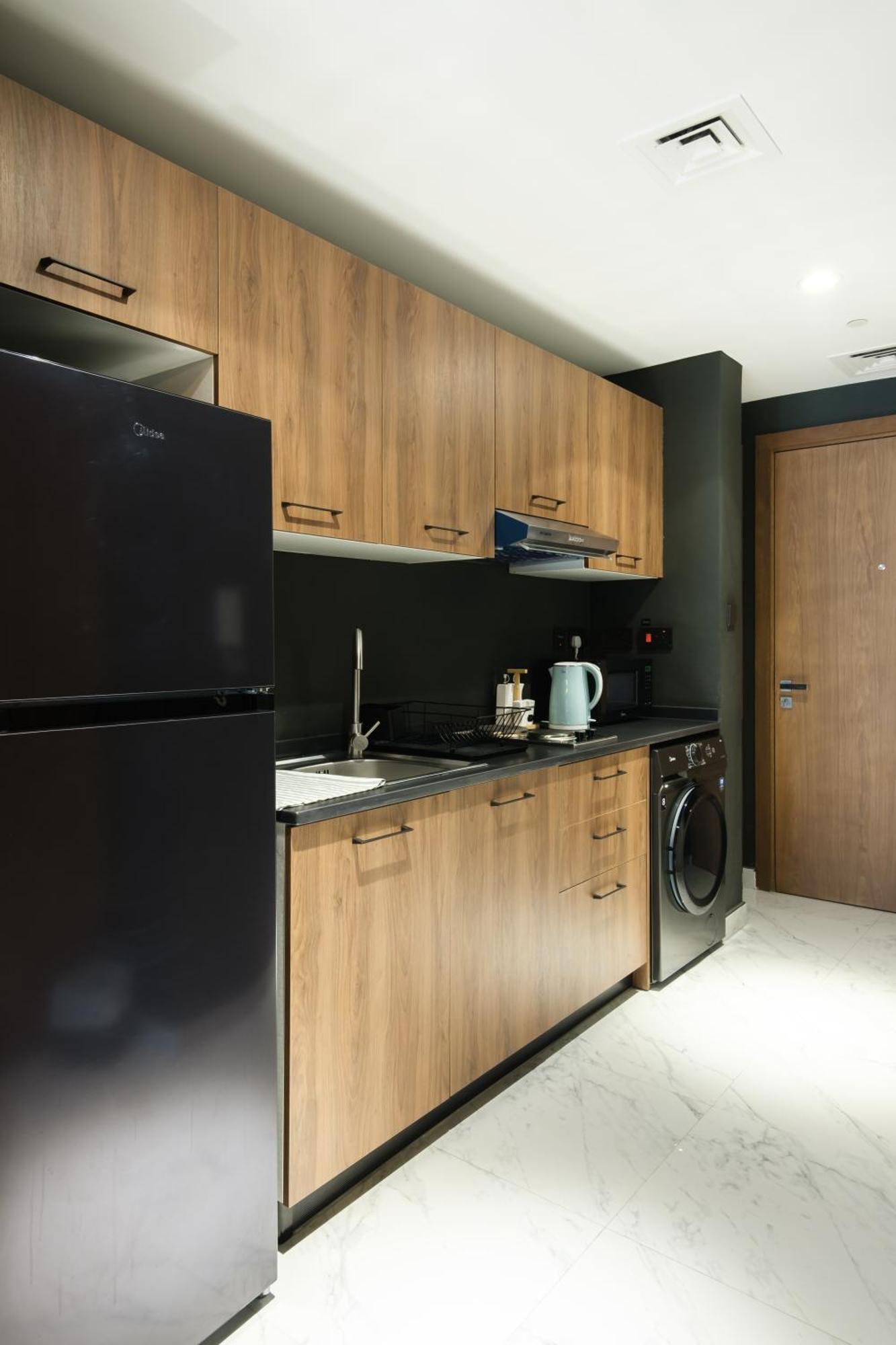 Appartement Industrial Chic Retreat à Al Qurayyah Extérieur photo